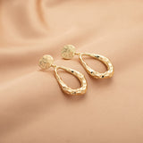 Hollow Waterdrop Pendant Gold Earrings Fashionable Style